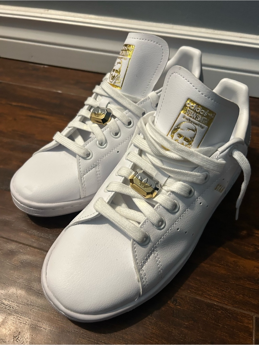 adidas Stan Smith Sneakers in White with Gold Accents